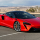 Front quarter view of 2023 McLaren Artura, in Burnt Orange.